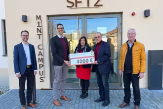 Lidl &uuml;bergibt F&ouml;rderscheck an SFTZ