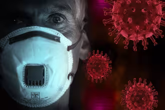 Ein Mann tr&auml;gt eine Masken, um sich vor dem Coronavirus zu sch&uuml;tzen. Die Masken sind ein wichtiger Schritt, um die Ausbreitung des Virus zu verlangsamen.
